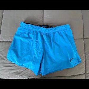 Blue Nike shorts